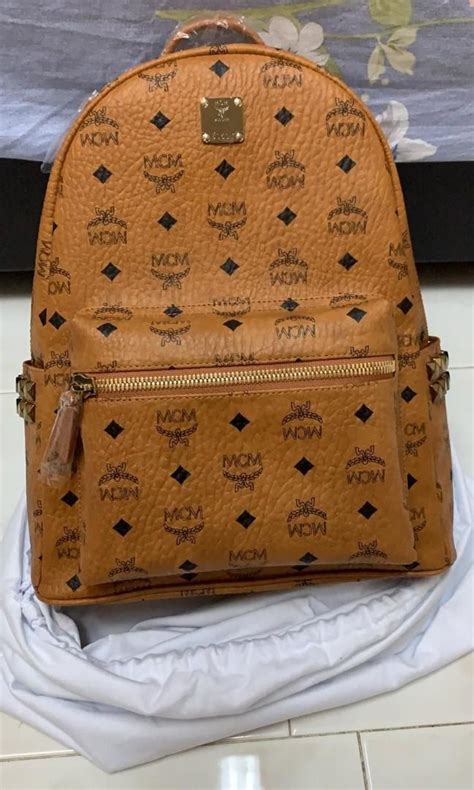 spot a fake mcm bag|genuine mcm bags.